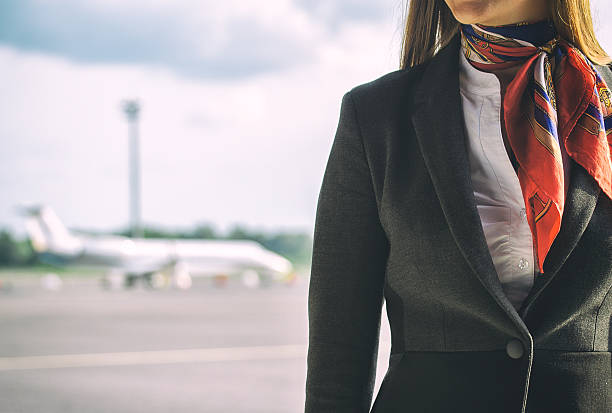 Stewardess on the airfield. Place for your text.